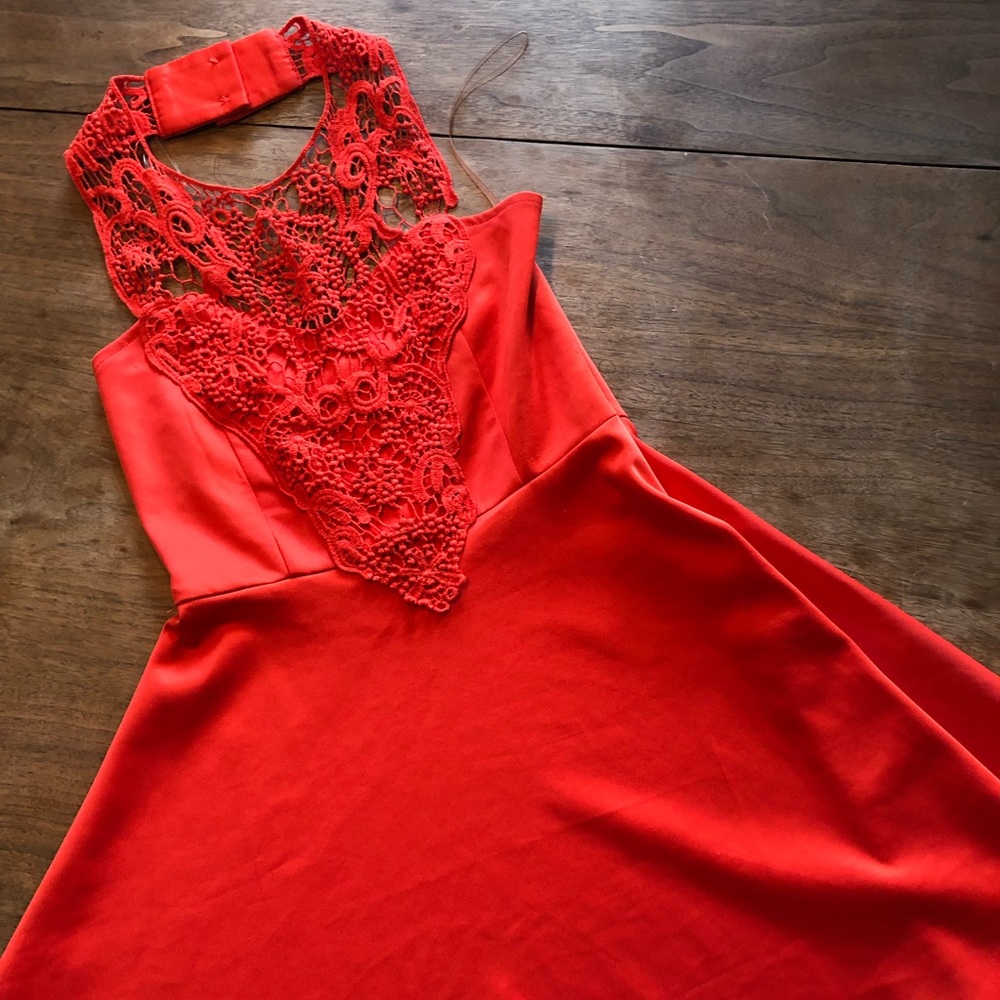 Bright red skater + lace dress.
